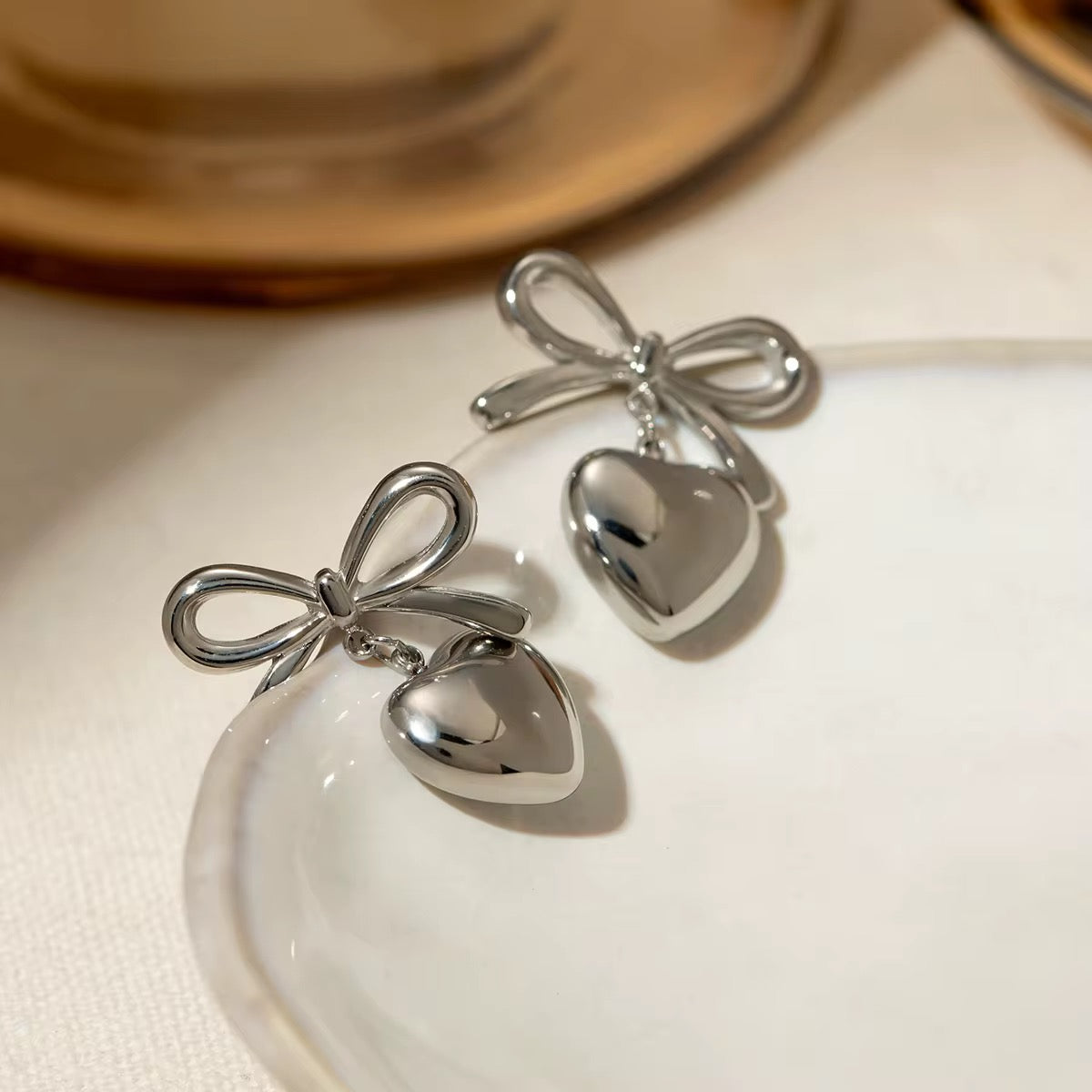 Loved Silver Bow Earrings
