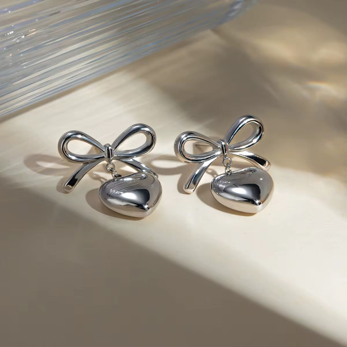 Loved Silver Bow Earrings