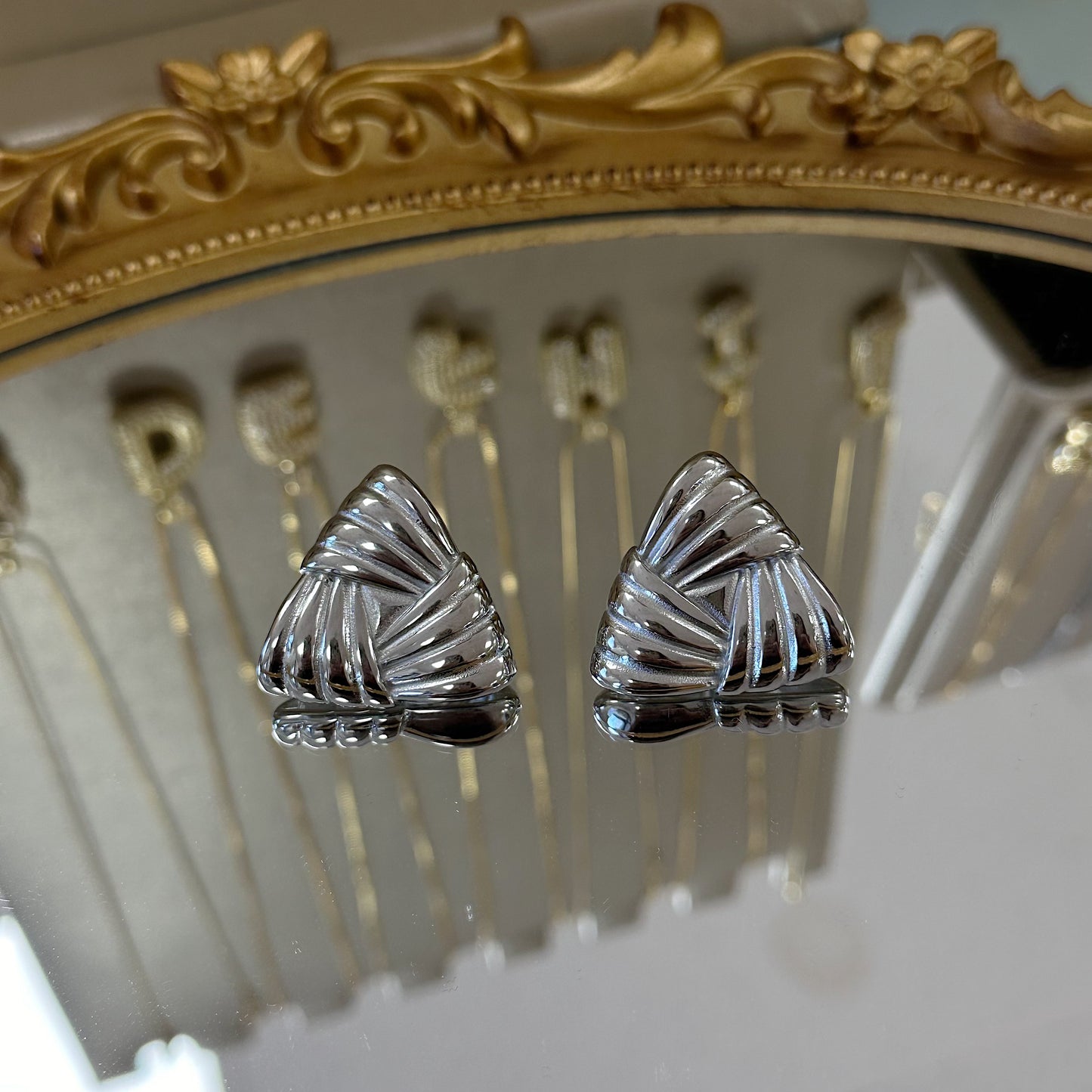 Triangle statement earrings