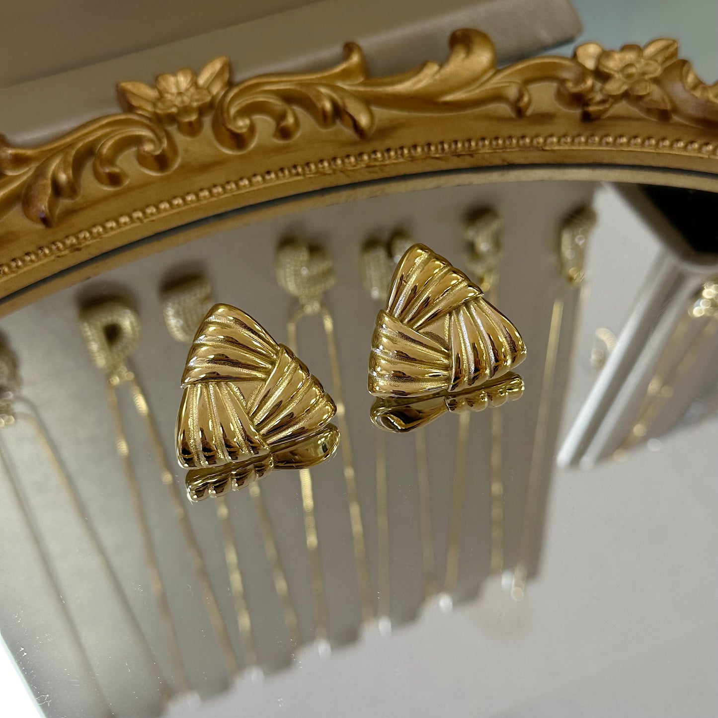 Triangle statement earrings