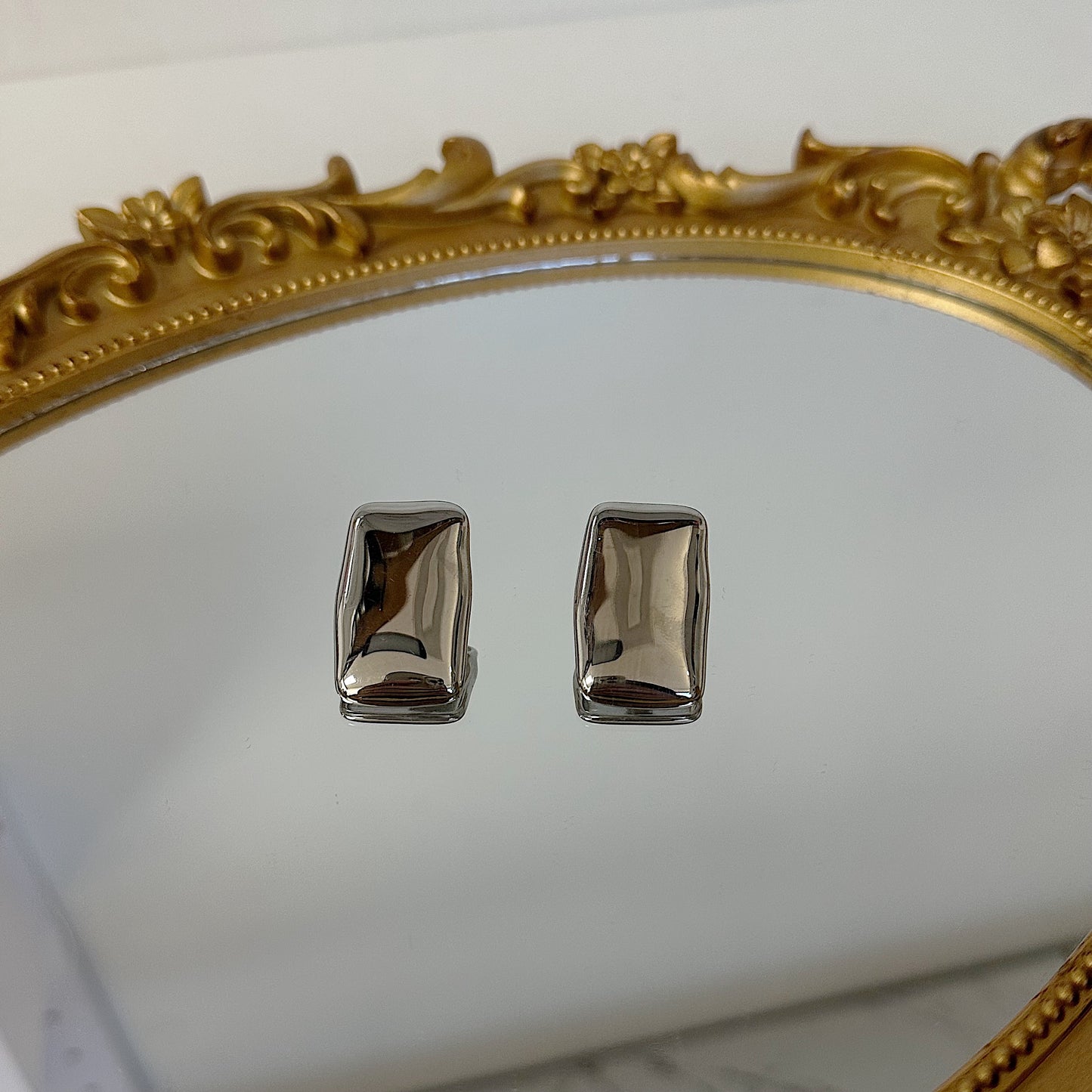 Silver statement earrings