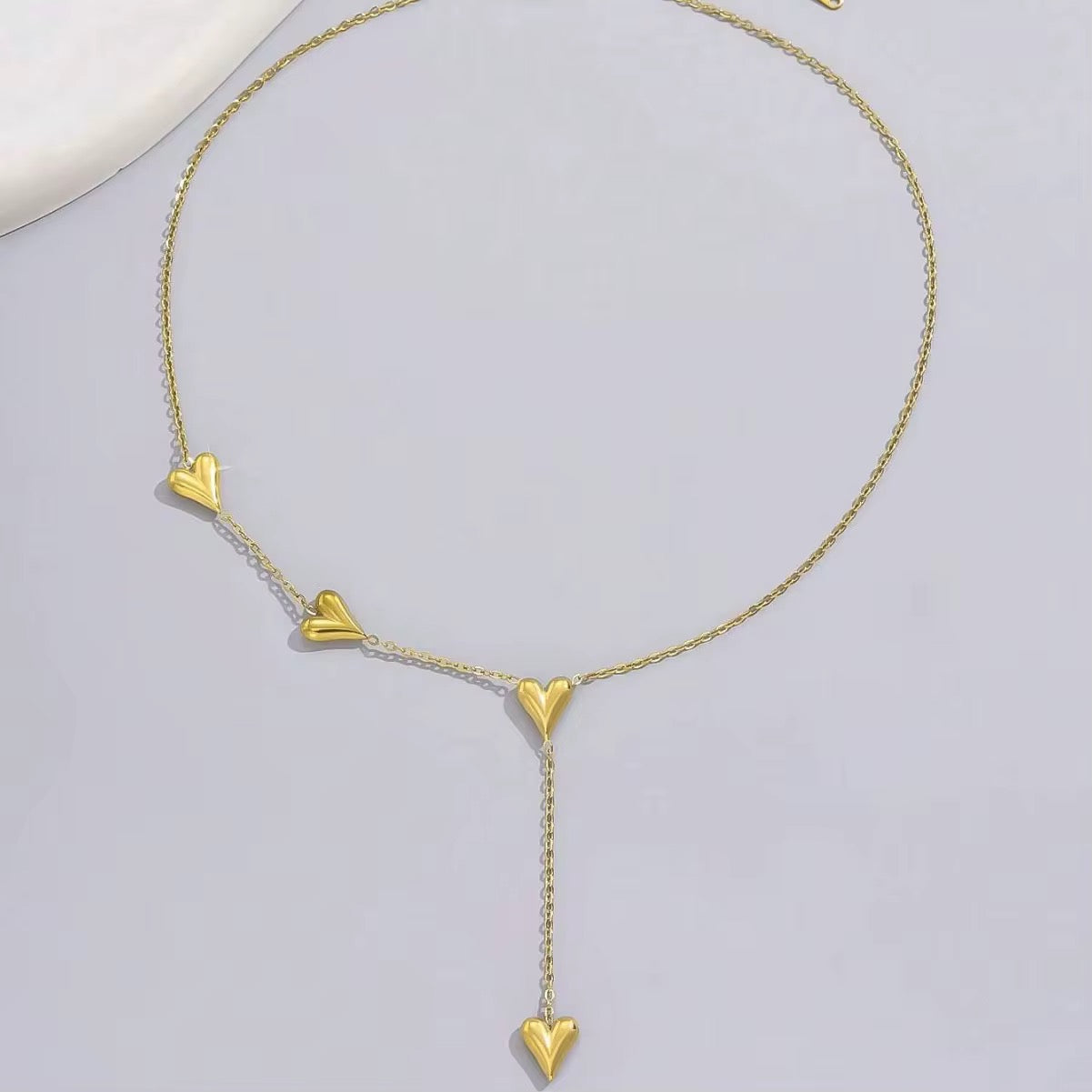 Heart tie necklace