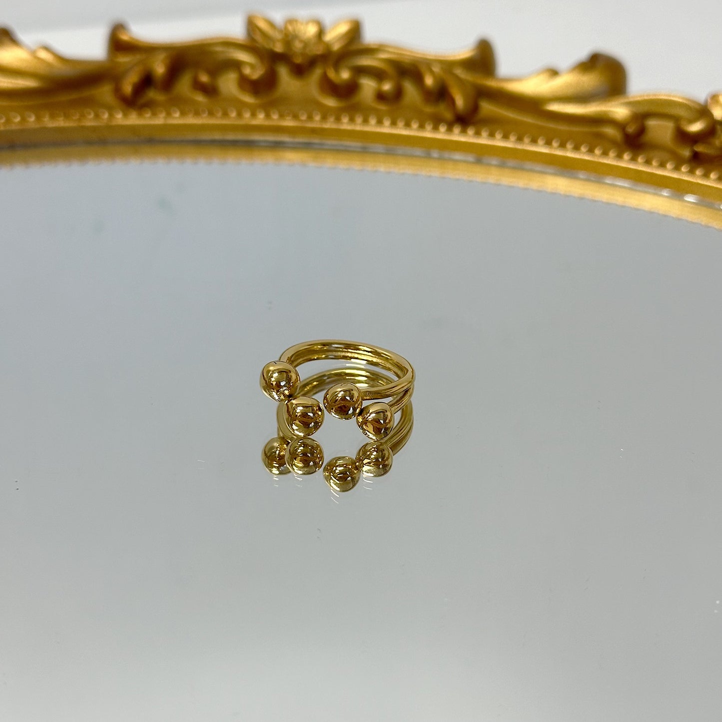 Globe gold adjustable ring