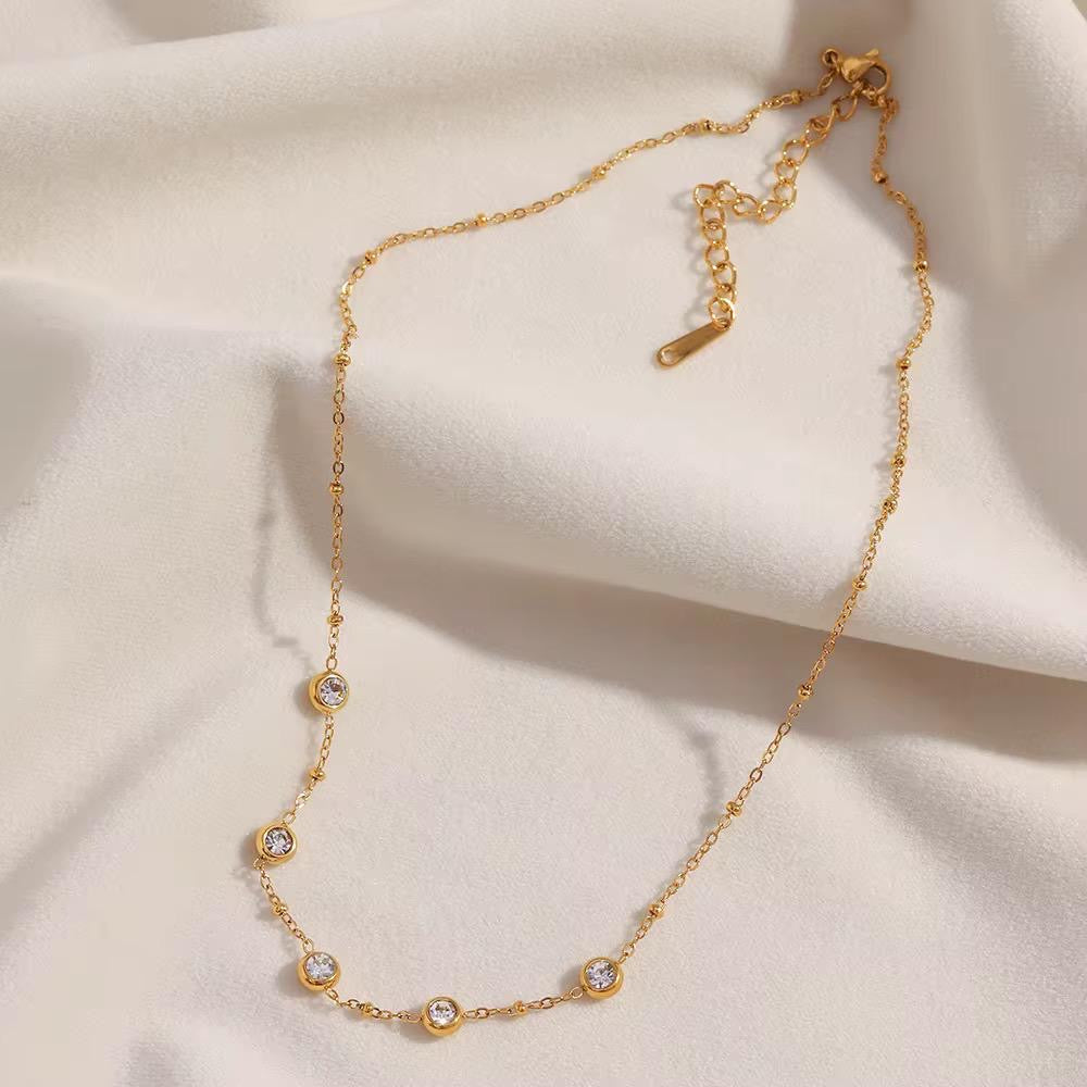 Gold and crystal necklace